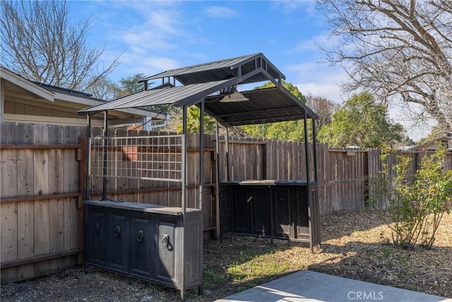 exterior space with a fenced backyard