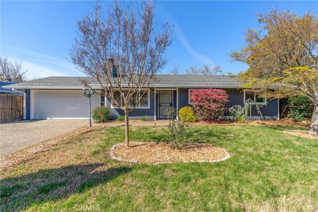 ranch-style house with fence, driveway, an attached garage, a chimney, and a front lawn