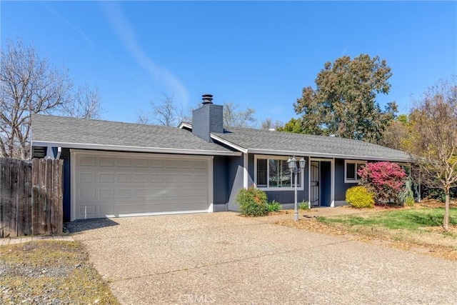 single story home featuring fence, roof with shingles, concrete driveway, a garage, and a chimney