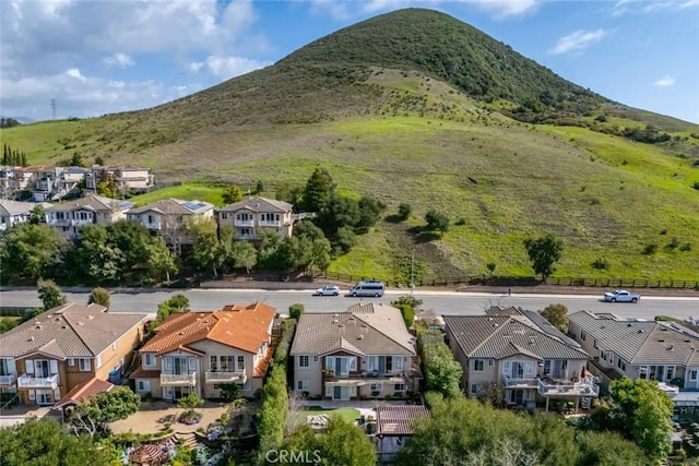 drone / aerial view with a mountain view and a residential view