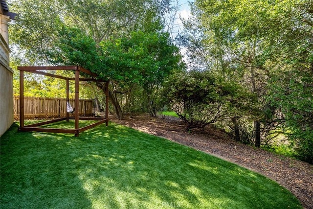 view of yard with fence