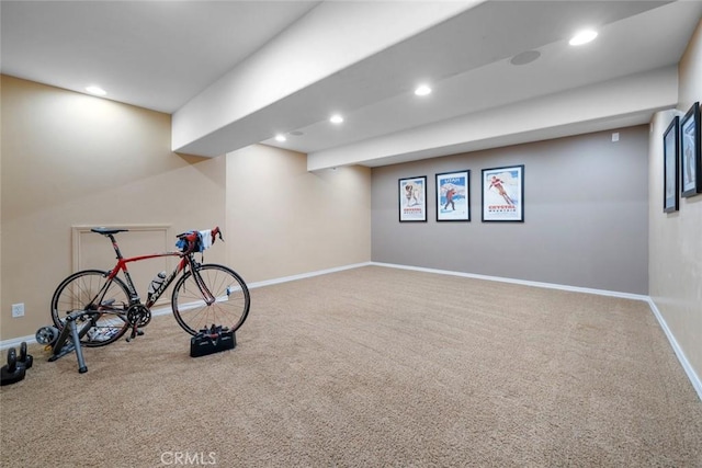 workout room with recessed lighting, baseboards, and carpet