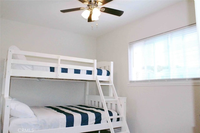 bedroom featuring ceiling fan