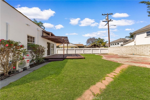 view of yard with a patio, central AC, a fenced backyard, and a pergola