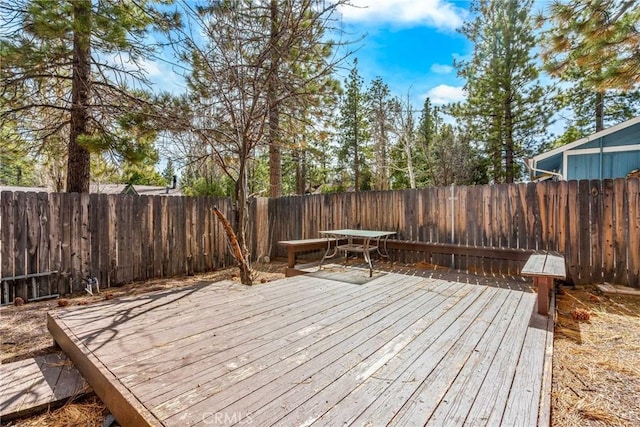 deck featuring a fenced backyard