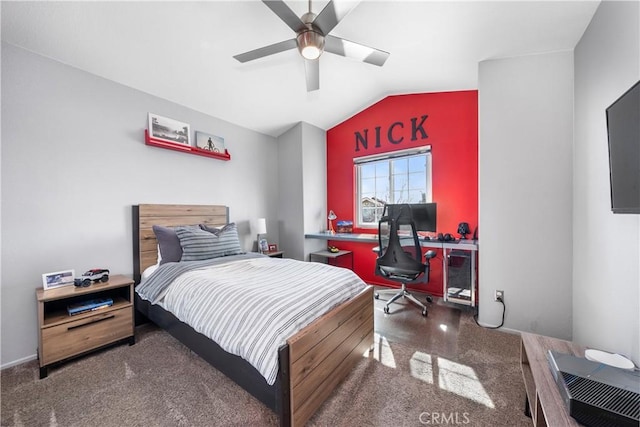 carpeted bedroom featuring ceiling fan and vaulted ceiling