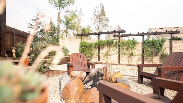 view of yard featuring a patio area and a fenced backyard