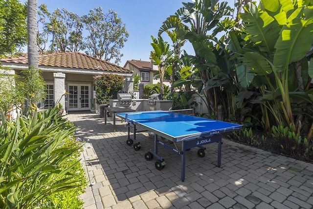 view of patio / terrace featuring french doors