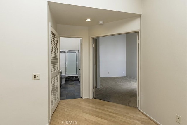 hall with light wood-style floors