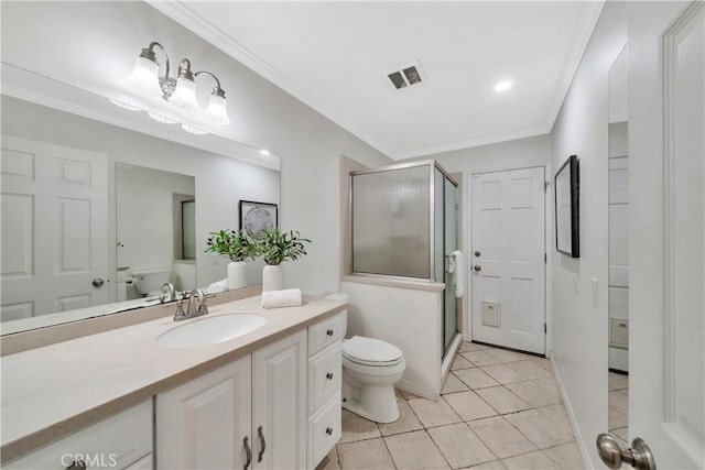 bathroom with visible vents, crown molding, toilet, a stall shower, and vanity