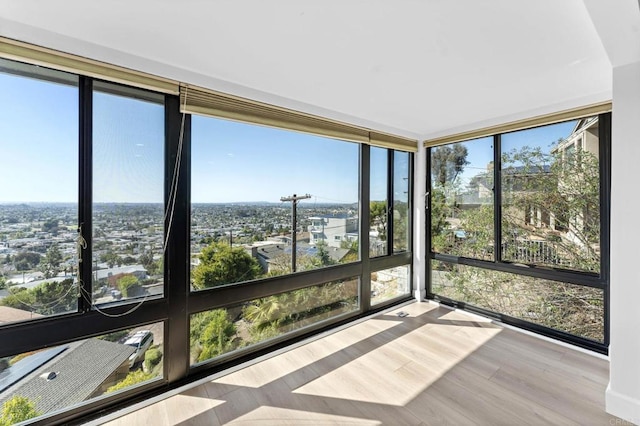 unfurnished sunroom featuring plenty of natural light