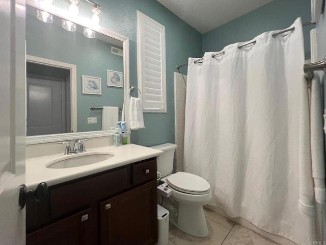 full bathroom featuring visible vents, toilet, a shower with curtain, tile patterned floors, and vanity