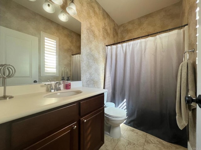 bathroom featuring tile patterned floors, curtained shower, toilet, and vanity