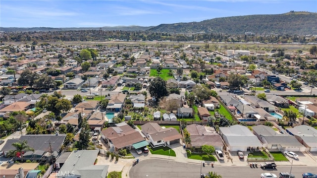 bird's eye view featuring a residential view and a mountain view