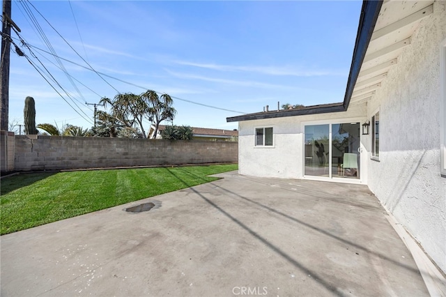 view of patio / terrace featuring fence