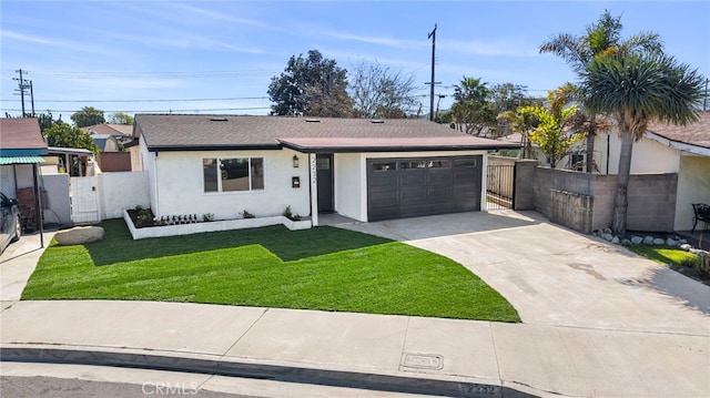 ranch-style home with a front lawn, a gate, fence, and driveway