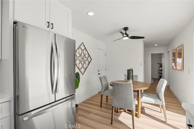 dining area with recessed lighting, baseboards, ceiling fan, and light wood finished floors