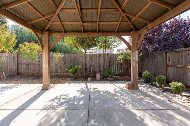 view of patio / terrace with a gazebo and a fenced backyard