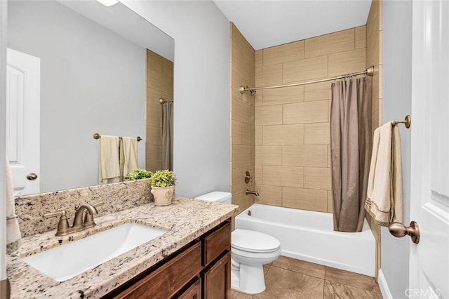 bathroom with vanity, tile patterned floors, shower / tub combo, and toilet