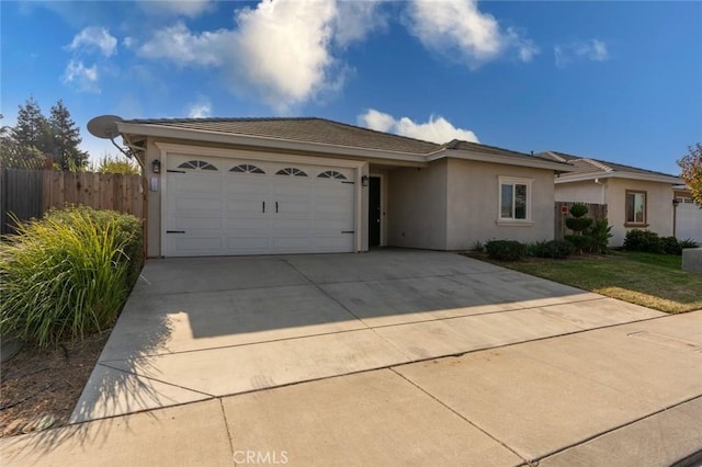 single story home featuring stucco siding, an attached garage, concrete driveway, and fence