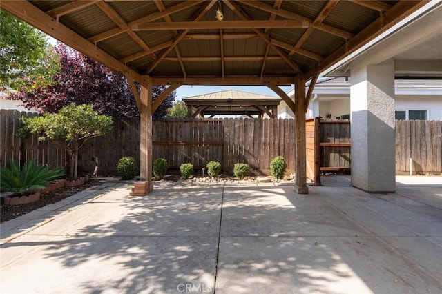 view of patio / terrace with a gazebo and fence