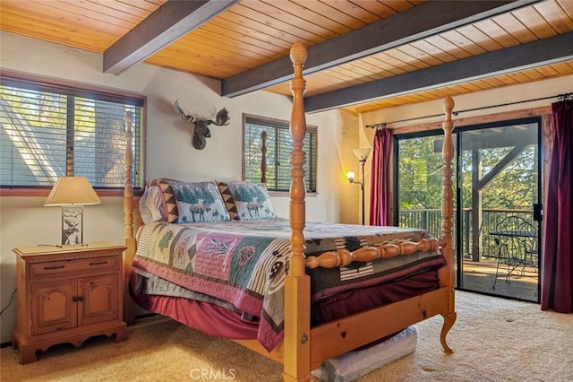 bedroom with access to exterior, beamed ceiling, multiple windows, and light colored carpet