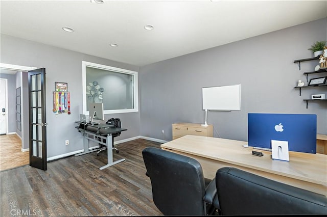 home office with recessed lighting, wood finished floors, and baseboards