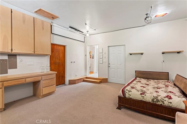 26509 Lake Forest Dr, Twin Peaks, CA 92391 - bedroom featuring built in study area and light carpet