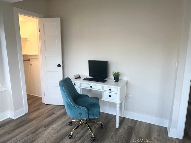 home office with baseboards and dark wood-style floors