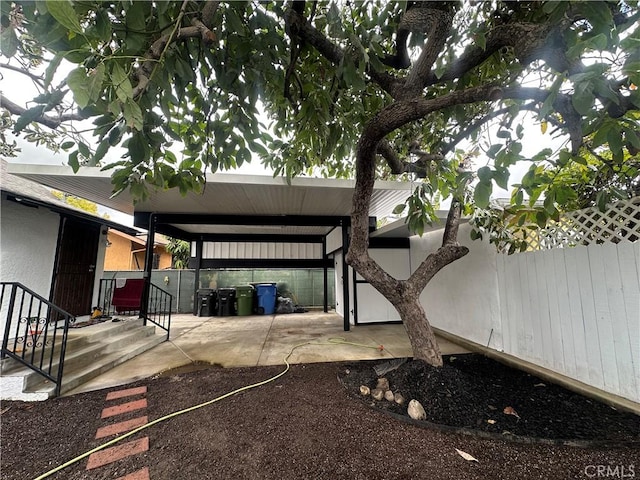 view of yard with a patio and fence