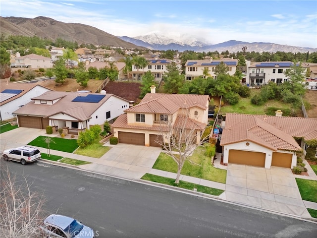 drone / aerial view featuring a mountain view and a residential view