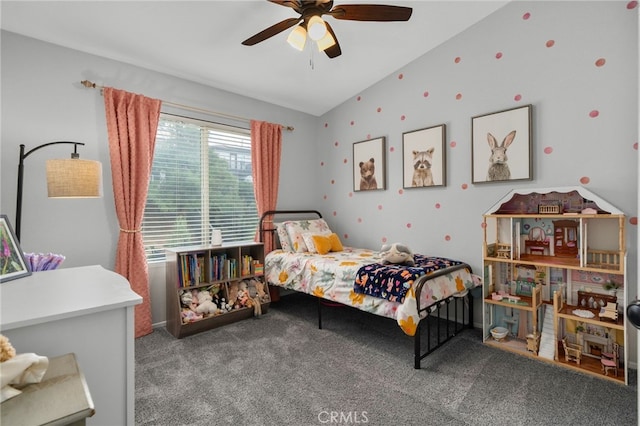 carpeted bedroom with ceiling fan and lofted ceiling