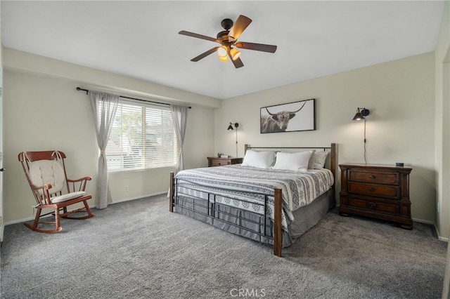 bedroom featuring baseboards, a ceiling fan, and carpet flooring