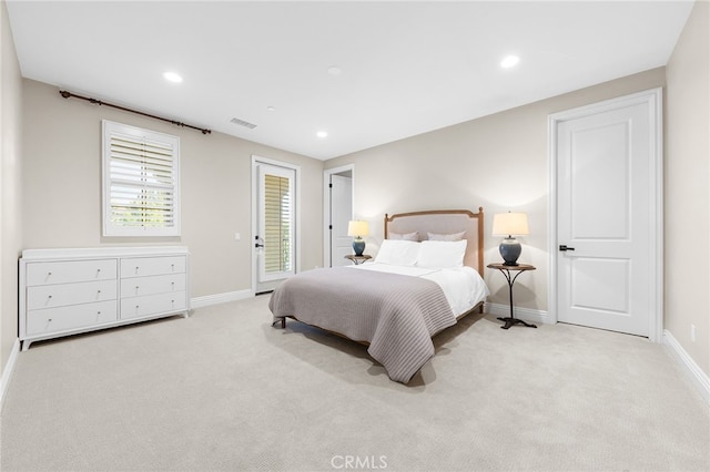 carpeted bedroom featuring recessed lighting, baseboards, and access to exterior