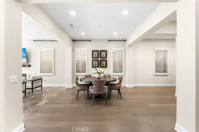 dining room with recessed lighting, wood finished floors, visible vents, and baseboards