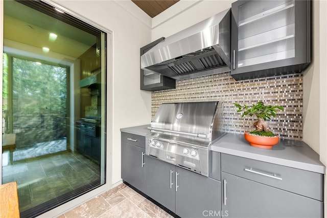 view of patio featuring area for grilling and exterior kitchen