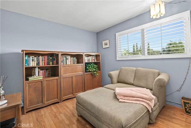 sitting room featuring light wood-style floors