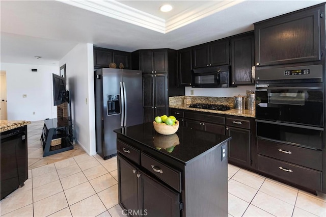 kitchen with a warming drawer, black appliances, light tile patterned flooring, and dark stone countertops