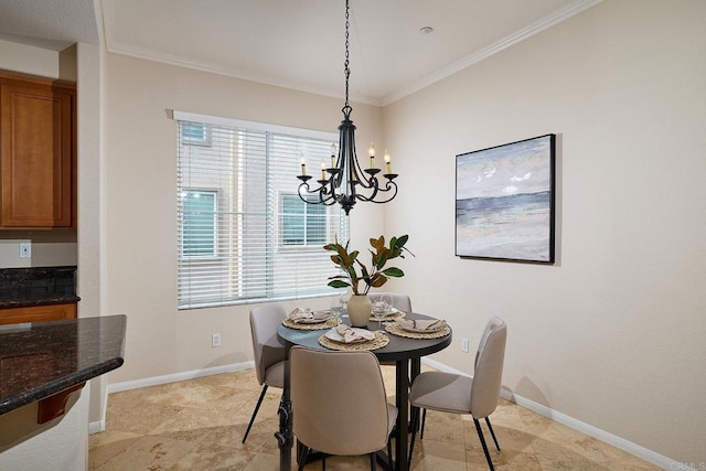 dining room featuring a notable chandelier, baseboards, and ornamental molding