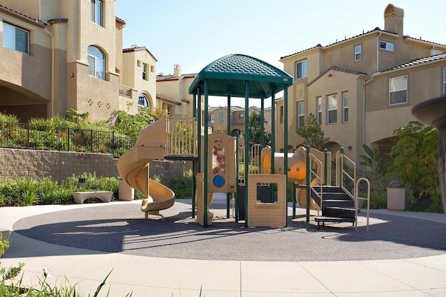 community play area with a residential view