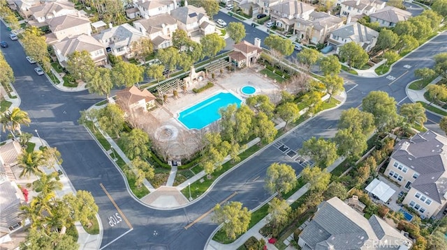 birds eye view of property with a residential view