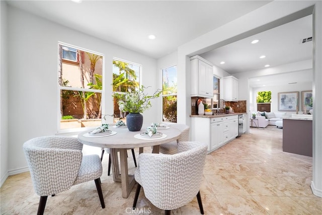 dining area featuring recessed lighting and visible vents