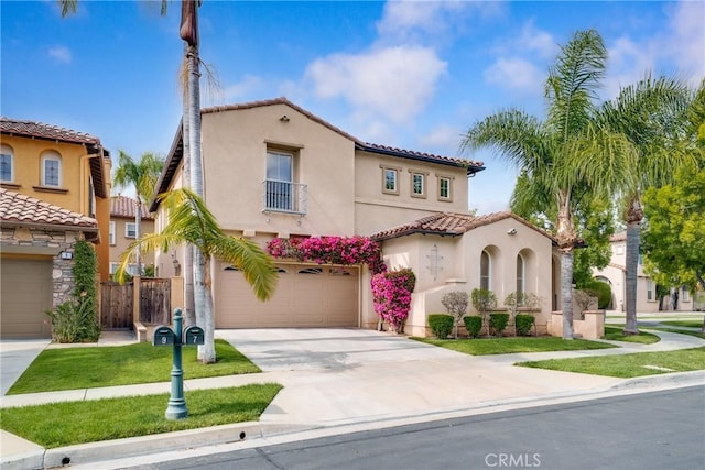 mediterranean / spanish-style house with stucco siding, driveway, fence, a garage, and a tiled roof