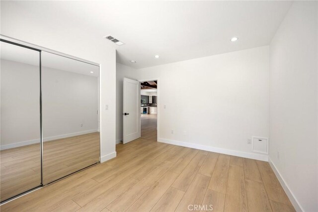 914 N Catalina St, Burbank, CA 91505 - unfurnished bedroom featuring light wood-type flooring, recessed lighting, a closet, and baseboards