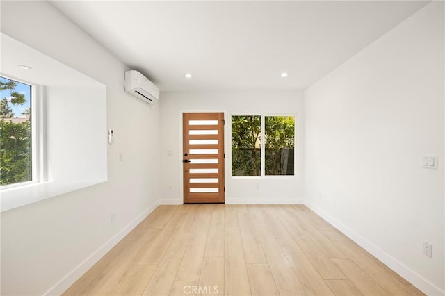914 N Catalina St, Burbank, CA 91505 - foyer featuring an AC wall unit, light wood-style floors, baseboards, and recessed lighting
