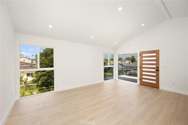 914 N Catalina St, Burbank, CA 91505 - spare room with vaulted ceiling, plenty of natural light, light wood finished floors, baseboards, and recessed lighting