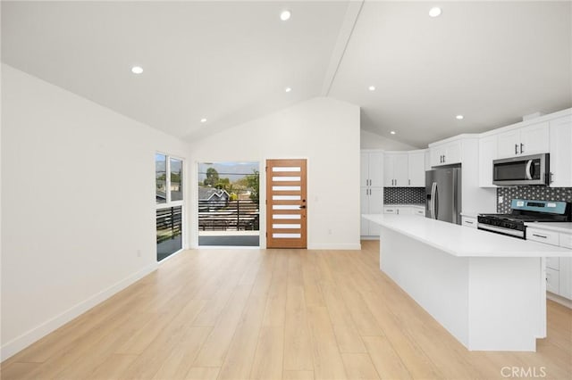 914 N Catalina St, Burbank, CA 91505 - kitchen with appliances with stainless steel finishes, light countertops, white cabinetry, baseboards, and recessed lighting