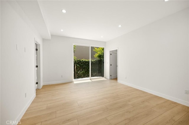914 N Catalina St, Burbank, CA 91505 - empty room with light wood-style flooring, recessed lighting, and baseboards
