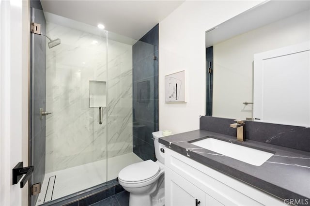 914 N Catalina St, Burbank, CA 91505 - full bathroom with vanity, a marble finish shower, toilet, tile patterned flooring, and recessed lighting