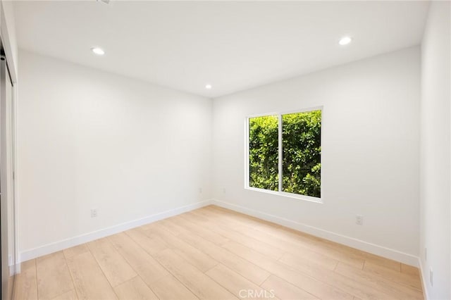 914 N Catalina St, Burbank, CA 91505 - empty room with light wood finished floors, recessed lighting, and baseboards
